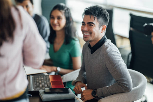 istock Engaging Team Discussions Set Against the Backdrop of a Modern Office Environment 2189762957