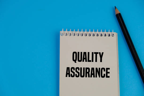 istock Business concept - Top view notebook writing Quality Assurance 2189763754