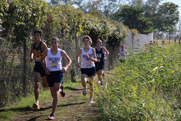 Start of a high school varsity cross country race.