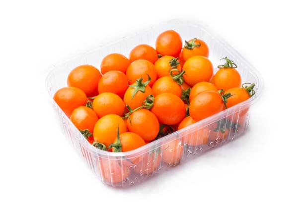 istock A container of orange cherry tomatoes on a white background 2189765155
