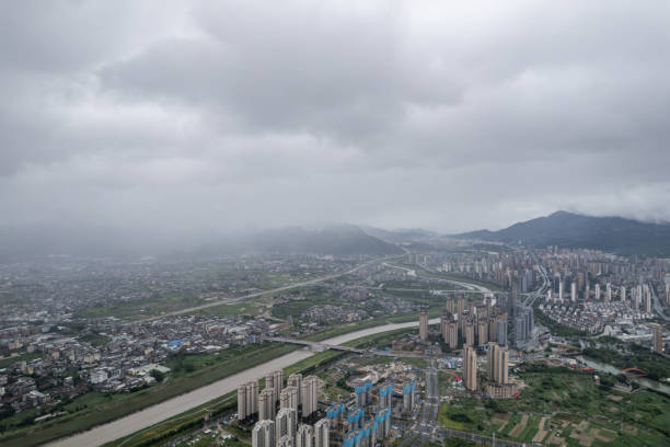 istock Cloudy day, city by the river 2189768781