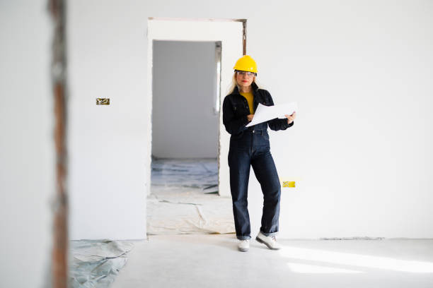istock Mid adult woman making home renovation 2189772417