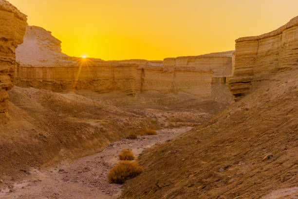 Sunrise view of the Masada Marls rocks formation (Havarey Masada), between Masada fortress and the Dead Sea, Judaean Desert, southern Israel