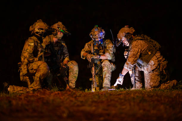 Soldiers ready to fire during Military Operation at night