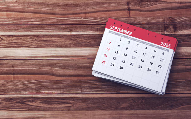 istock September 2025 Calendar sitting on Dark Wooden background 2189779335