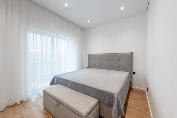 istock Modern Home Minimalist Bedroom Design Interior with Natural Light and Neutral Tones 2189784039