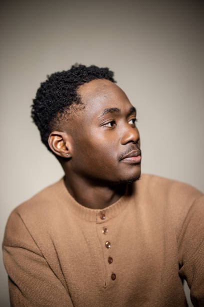 istock Side Profile of a Young Black Man in Professional Studio 2189785815