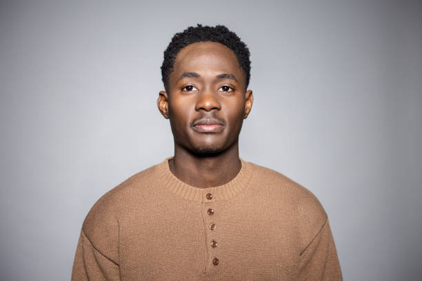 istock Focused Expression of a Young Black Man in a Studio 2189786017