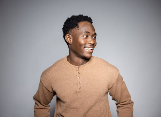 Side Profile of a Young Black Man in a Studio Session