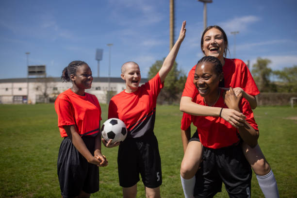 istock Female soccer players celebrating victory 2189786696