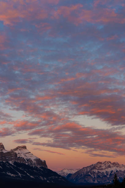 From left to right are Mount Rundle, Mount Norquay, and Cascade Mountain near Banff in Alberta, Canada, at sunrise.