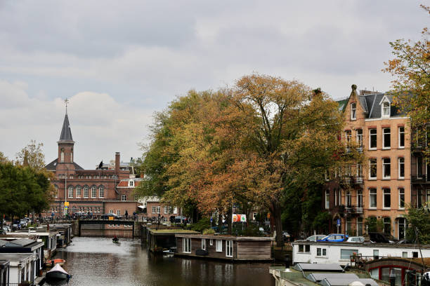 Traditional dutch old houses and bridges on canals in Amsterdam, Netherlands.