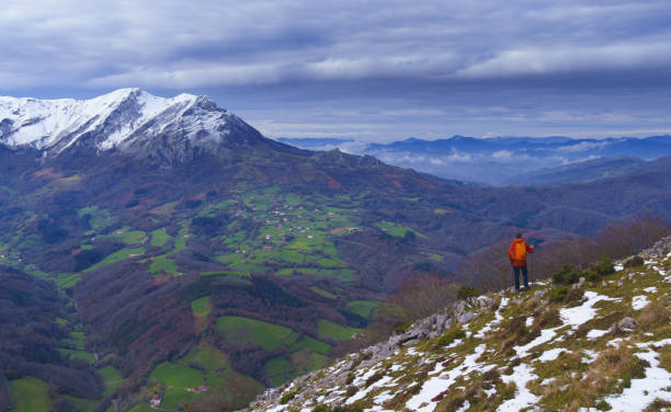 istock Aralar mountain range in Navarra. Hiker in the Araitz valley with Azkarate and Balerdi mountain, Navarra. 2189791531