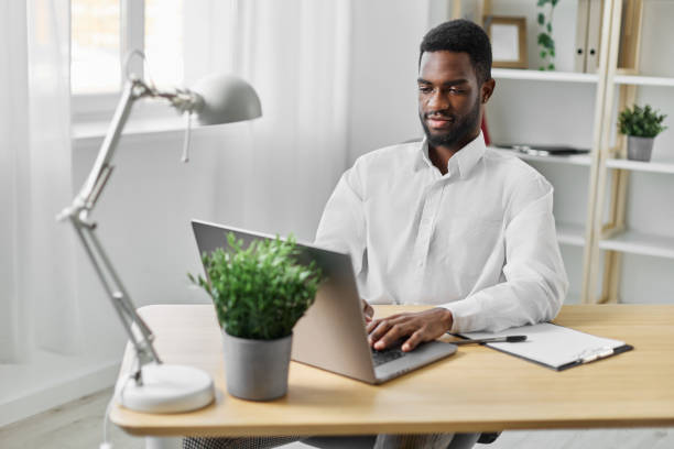 istock african man student american education online laptop computer office freelancer entrepreneur job 2189794584