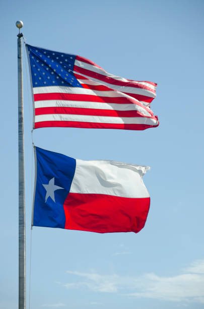 istock American Flag and Texas State Flag Flying 2189796538