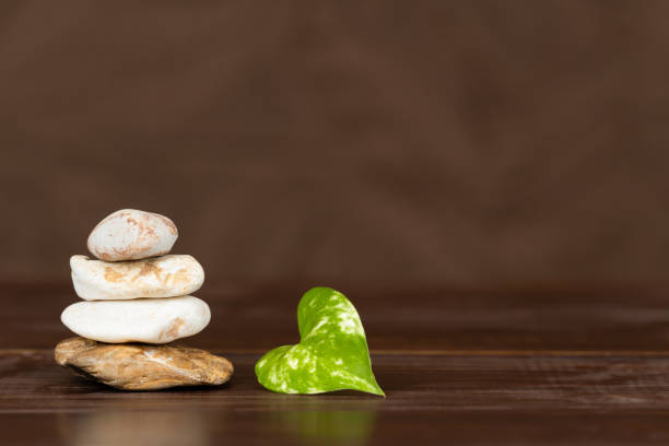 Balance stones and a leaf, harmony and life coaching background with copy space