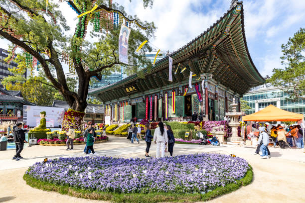 Seoul, South Korea - October 22 2023: Jogyesa Temple (조계사).It is the spiritual center of Korean Zen Buddhism (Seon) and is famous for its stunning floral arrangements, especially during the annual Lotus Lantern Festival. At the temple, you’ll find impressive Buddha statues and a peaceful, meditative atmosphere right in the heart of the city.