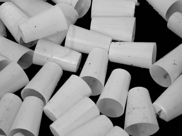 many empty used plastic cups lying on the ground after a running event