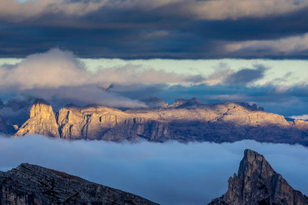 istock Above the clouds mountain landscape in the Dolomiti Alps. Mountain cloudscape 2189812384