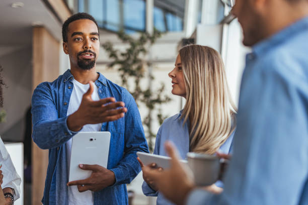 istock Team Meeting Discussion with Colleagues in Modern Office Space 2189818208