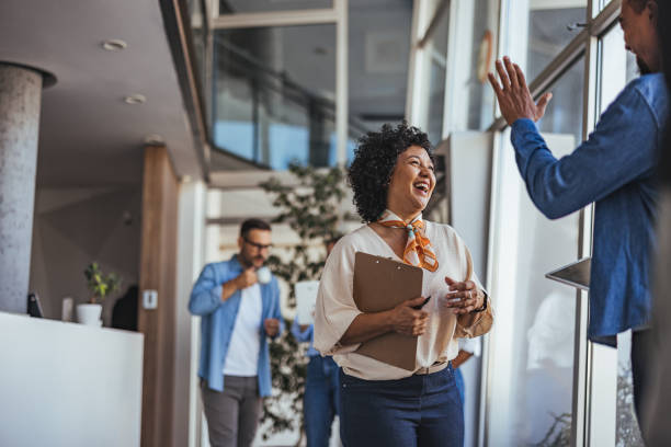 istock Happy Professionals Engaging in a Productive Office Environment 2189818243