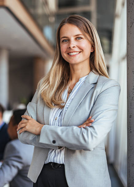 istock Confident Young Businesswoman Smiling in Modern Office Environment 2189818286