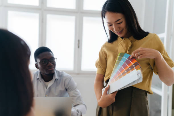 istock Architecture designers choosing from a colour palette 2189819739