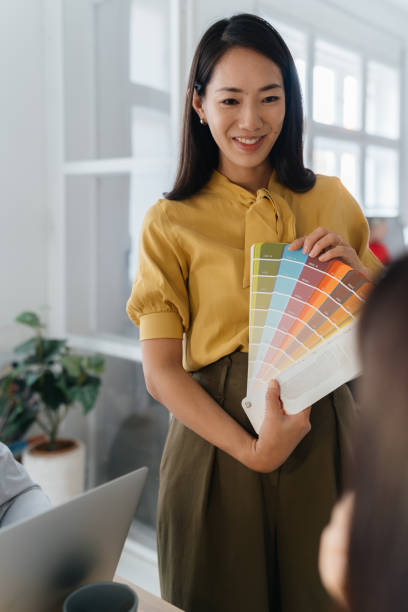 Interior designer holding color palette