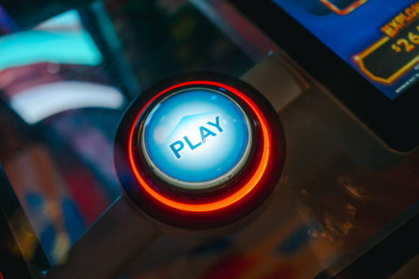istock Casino Slot Machine - Play Button - Close Up - Red 2189821623