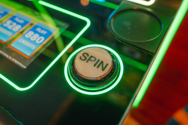 istock Casino Slot Machine - Play Button - Close Up - Green 2189821807