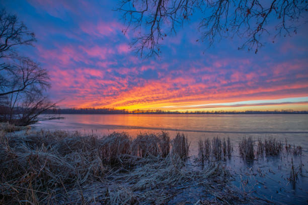 istock Sunset at the Lake in Winter 2189825536