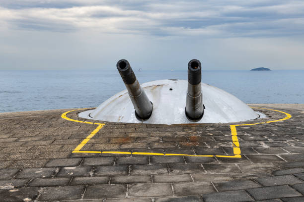 Rio de Janeiro, Brazil, November 8, 2024: View of the cannon on the Copacabana Fort in Rio de Janeiro under cloudy sky.