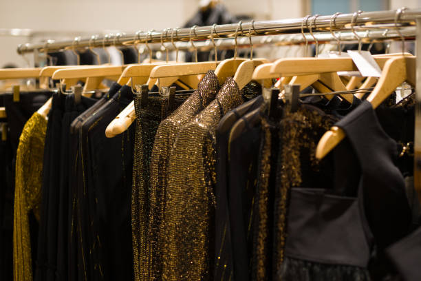 istock Shiny women's outfits on a hanger in the store. 2189830295