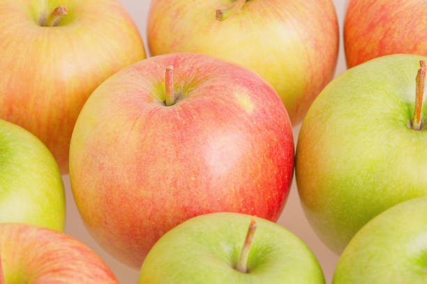 Close-Up Of Apples Over White Background