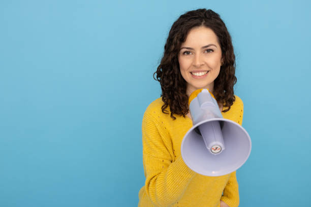 istock Passionate Latina activist with a megaphone 2189837149
