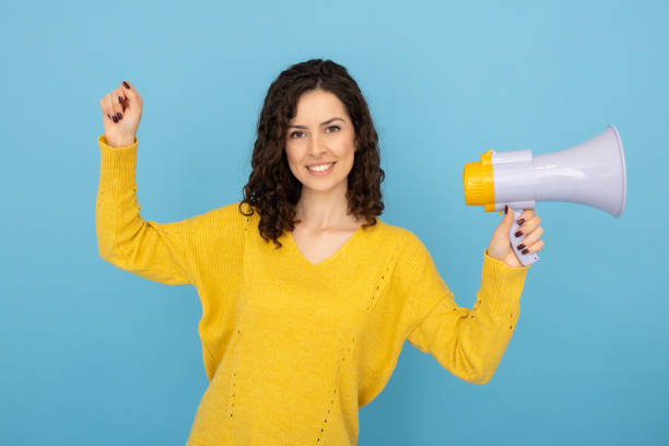 istock Focused Latina with a megaphone ready to lead 2189837297