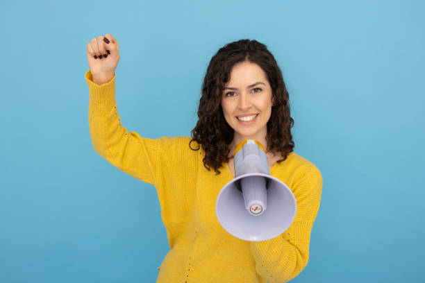 istock Focused Latina with a megaphone ready to lead 2189837299