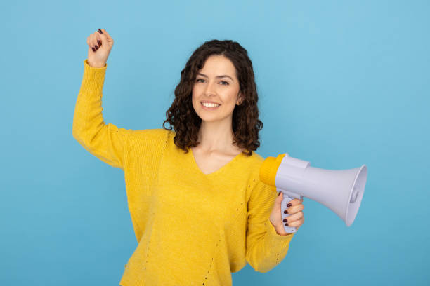 istock Focused Latina with a megaphone ready to lead 2189837457