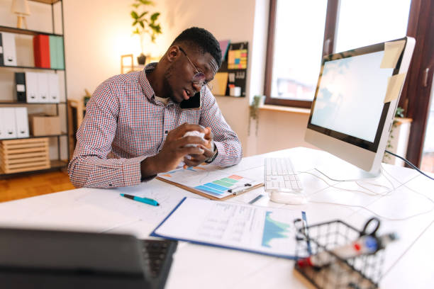 istock Man is talking on the phone. 2189846962