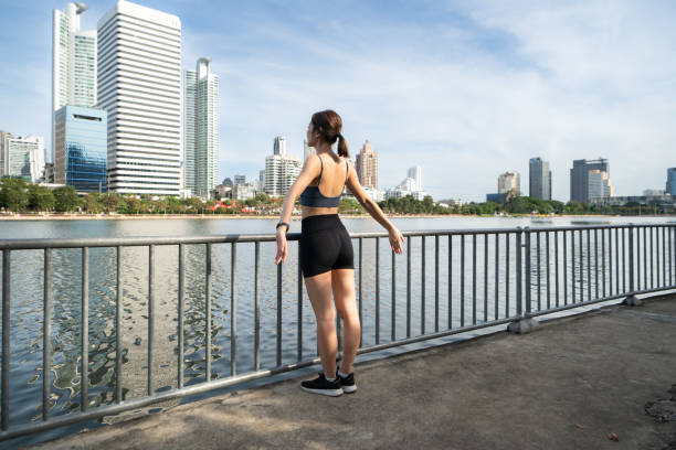 istock Young woman and exercise time in a city park 2189847148