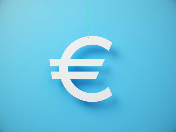 istock Euro symbol cut on white note paper hanging on string, White note paper on a blue Background. 2189849916
