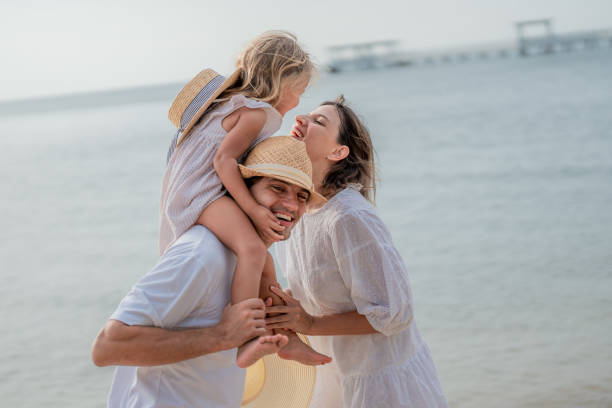 istock Happy family holidays on the beach. 2189858746
