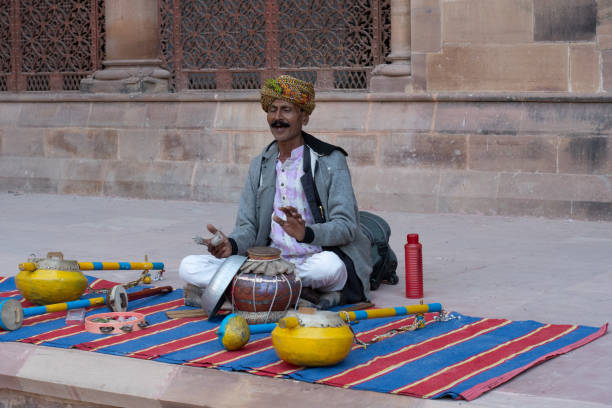 aaina mahal, darbargadh, bhuj, kutch, gujarat, india - december 13, 2024 : traditional gujarati folk singer performing