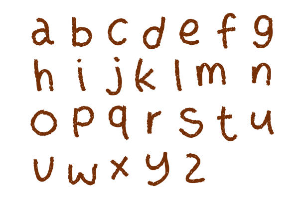 istock A set of lowercase letters of the alphabet written with brown crayon 2189866599