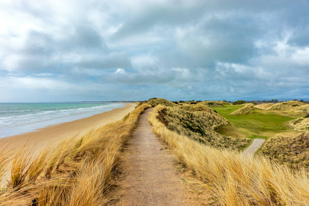 istock walking path along the top of sand dunes with golf course and ocean views 2189873235