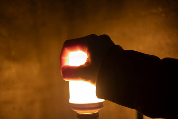 Holding hand open with glowing lights