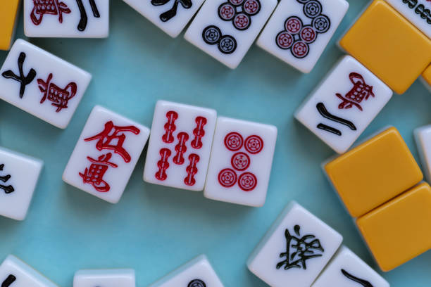 istock Mahjong tiles lined up on a blue background 2189883140