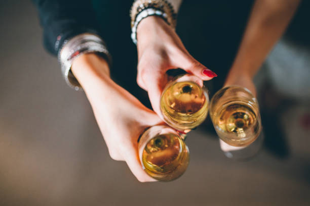 istock Group Toasting with Champagne Glasses in a Celebration Party Setting 2189883434