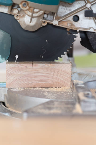 istock Cutting wood with an electric saw 2189883942