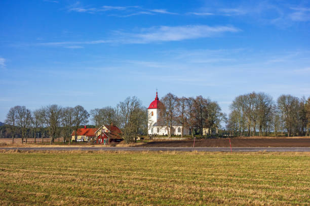 istock Church in the countryside by fields 2189884012
